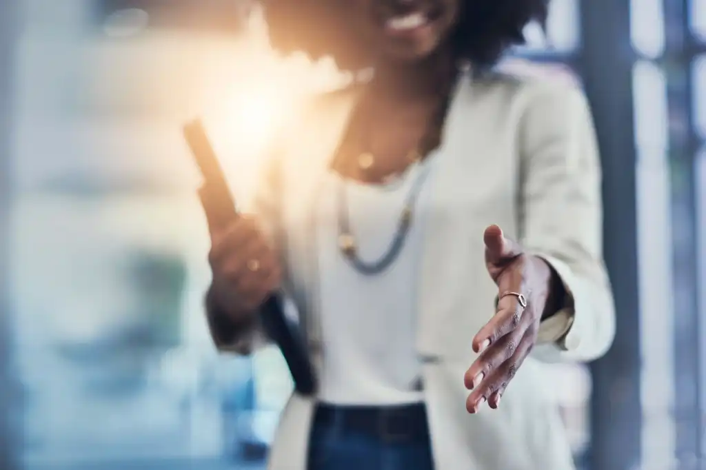 diversity south african woman reaching out to shake hands make deal south africa merger and acquisi