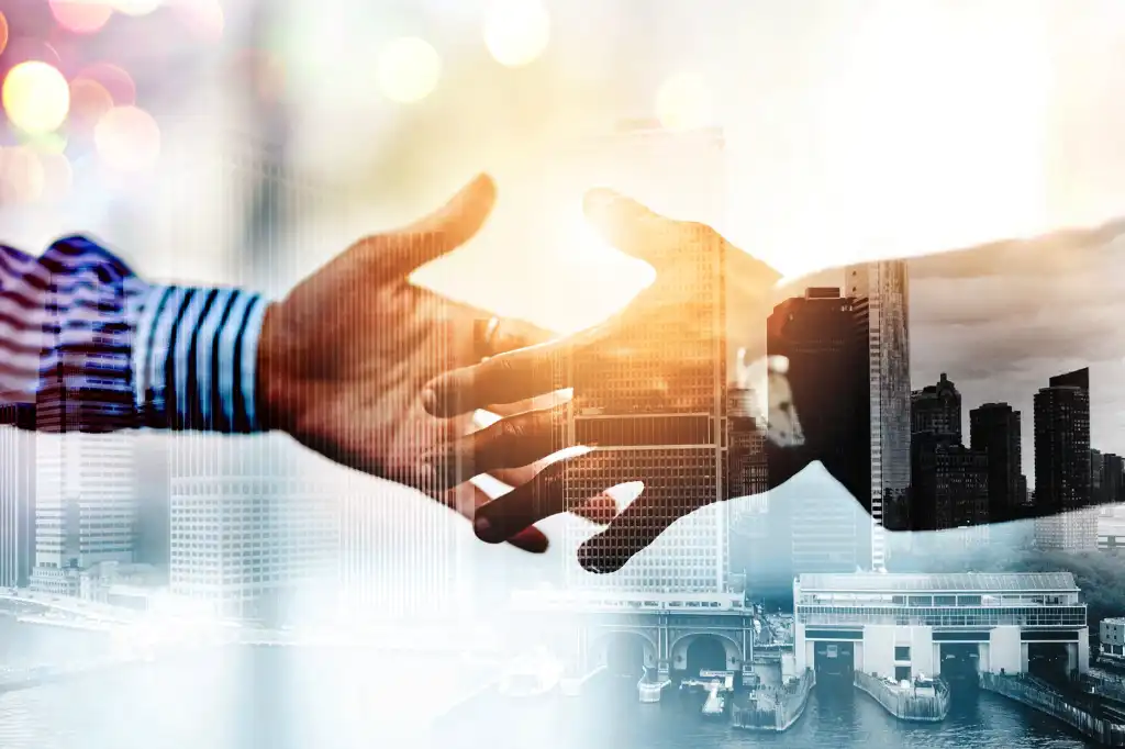 handshake / teamwork / collaboration / partnership / deal / negotiation