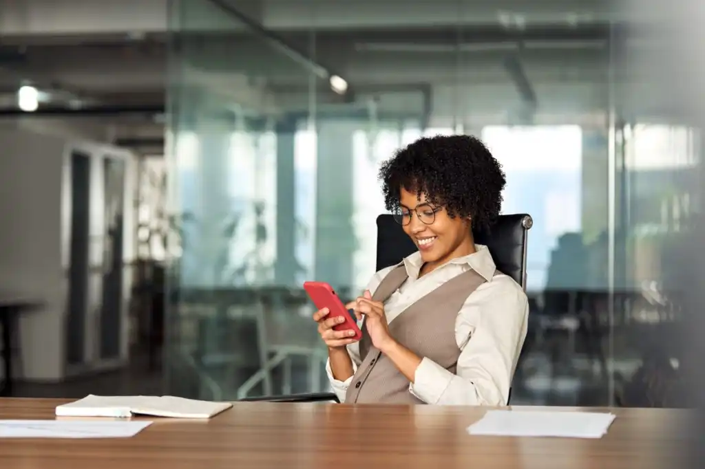 Professional woman using phone
